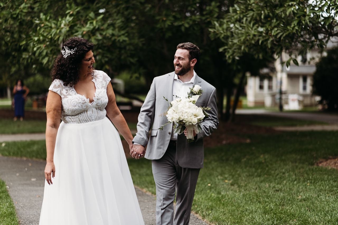 Bride & Groom Walking Down Path