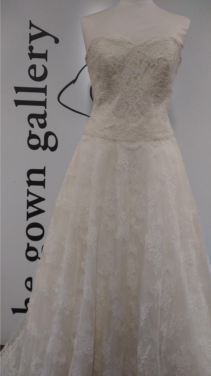 Glamorous Lace Fit-and-Flare Wedding Gown With Plunging Neckline – TulleLux  Bridal Crowns & Accessories